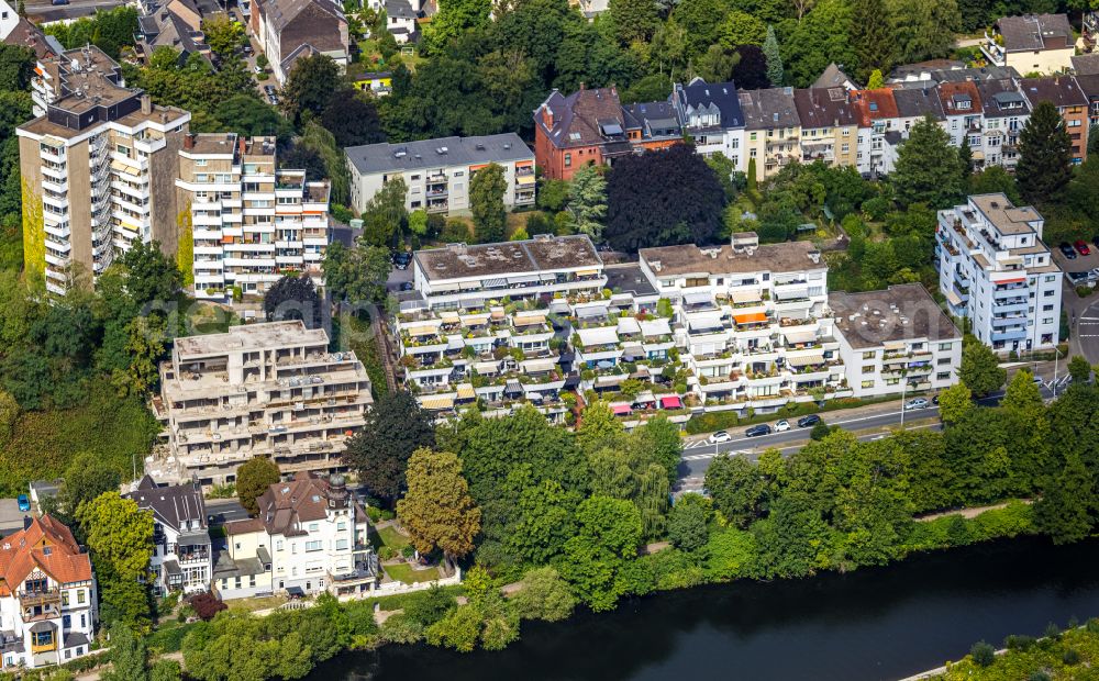 Mülheim an der Ruhr from above - Residential area of a multi-family house settlement with terraced houses and a ruined building on the bank and river the Ruhr in Muelheim on the Ruhr at Ruhrgebiet in the state North Rhine-Westphalia, Germany