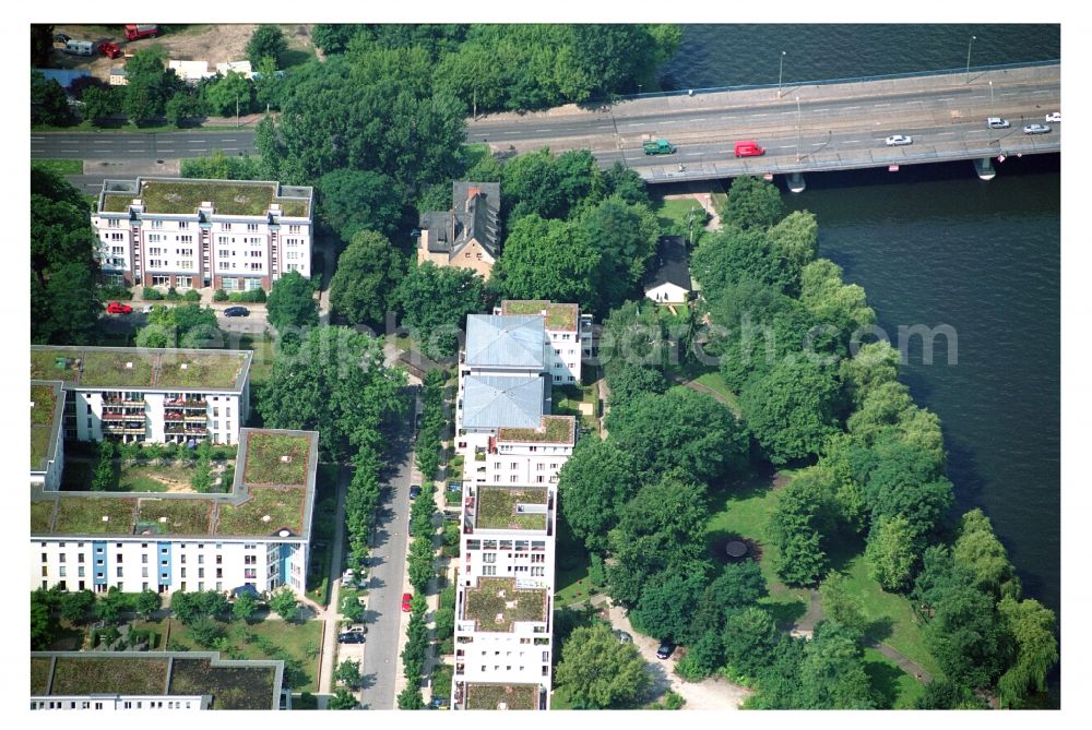 Berlin from above - Residential area of a multi-family house settlement on the bank and river of Mueggelspree on street Salvador-Allende-Strasse in the district Koepenick in Berlin, Germany