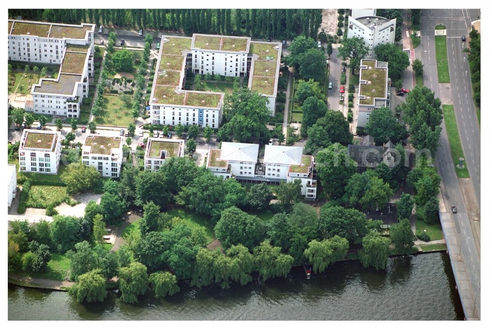 Berlin from above - Residential area of a multi-family house settlement on the bank and river of Mueggelspree on street Salvador-Allende-Strasse in the district Koepenick in Berlin, Germany