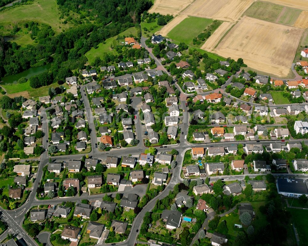 Aerial image Annerod - Residential area - mixed development of a multi-family housing estate and single-family housing estate in Annerod in the state Hesse, Germany