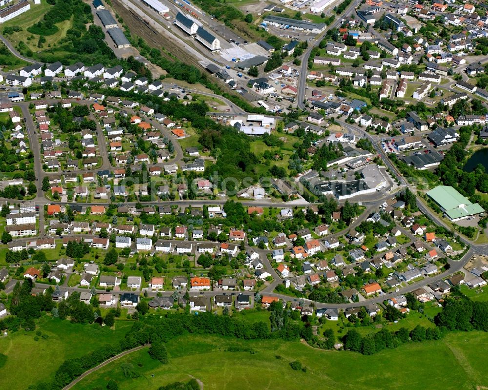 Baumholder from the bird's eye view: Residential area - mixed development of a multi-family housing estate and single-family housing estate in Baumholder in the state Rhineland-Palatinate, Germany