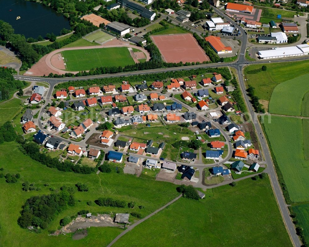 Baumholder from above - Residential area - mixed development of a multi-family housing estate and single-family housing estate in Baumholder in the state Rhineland-Palatinate, Germany