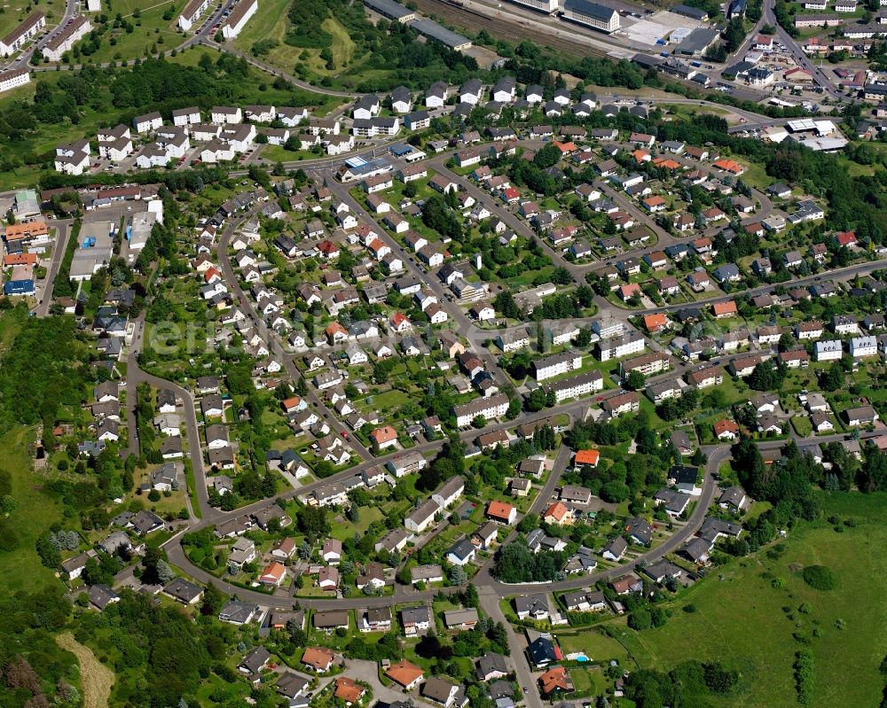 Baumholder from the bird's eye view: Residential area - mixed development of a multi-family housing estate and single-family housing estate in Baumholder in the state Rhineland-Palatinate, Germany