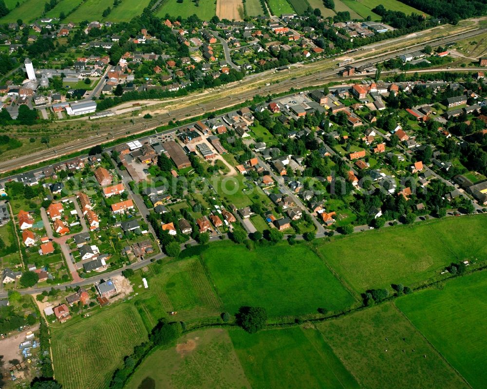 Büchen from the bird's eye view: Residential area - mixed development of a multi-family housing estate and single-family housing estate in Büchen in the state Schleswig-Holstein, Germany