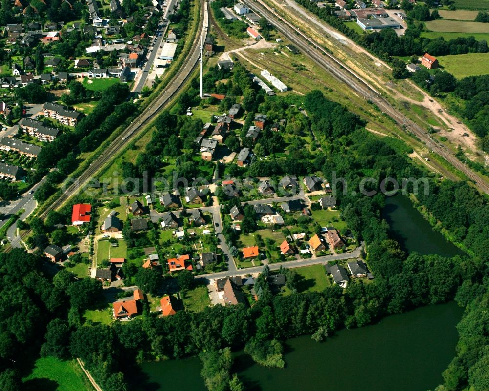 Büchen from above - Residential area - mixed development of a multi-family housing estate and single-family housing estate in Büchen in the state Schleswig-Holstein, Germany