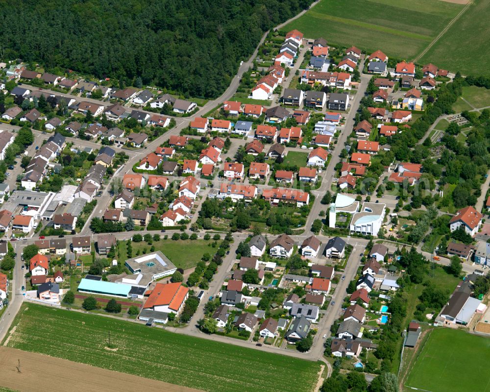 Büchig from the bird's eye view: Residential area - mixed development of a multi-family housing estate and single-family housing estate in Büchig in the state Baden-Wuerttemberg, Germany