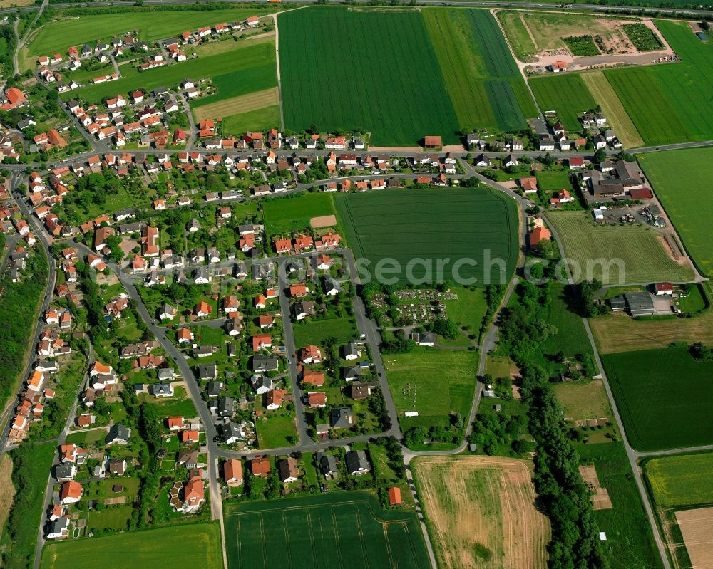 Breitenbach from above - Residential area - mixed development of a multi-family housing estate and single-family housing estate in Breitenbach in the state Hesse, Germany