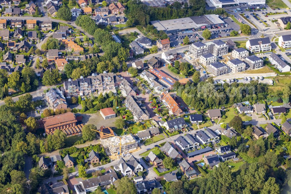 Brüggen from above - Residential area - mixed development of a multi-family housing estate and single-family housing estate on street Am Herrenlandpark - In der Haag in Brueggen in the state North Rhine-Westphalia, Germany