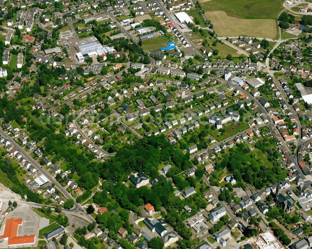 Burgbirkenfeld from the bird's eye view: Residential area - mixed development of a multi-family housing estate and single-family housing estate in Burgbirkenfeld in the state Rhineland-Palatinate, Germany