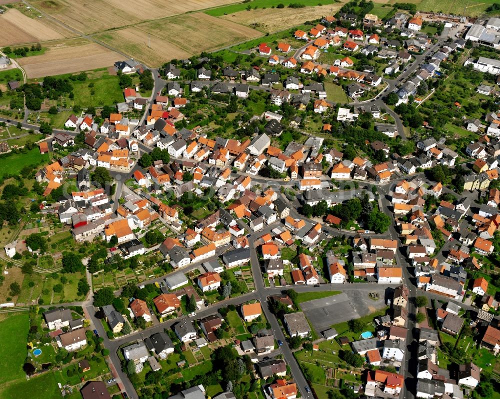 Aerial image Burkhardsfelden - Residential area - mixed development of a multi-family housing estate and single-family housing estate in Burkhardsfelden in the state Hesse, Germany