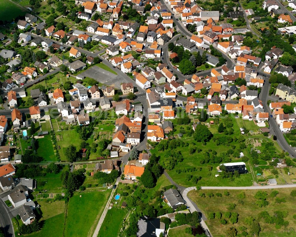 Aerial photograph Burkhardsfelden - Residential area - mixed development of a multi-family housing estate and single-family housing estate in Burkhardsfelden in the state Hesse, Germany