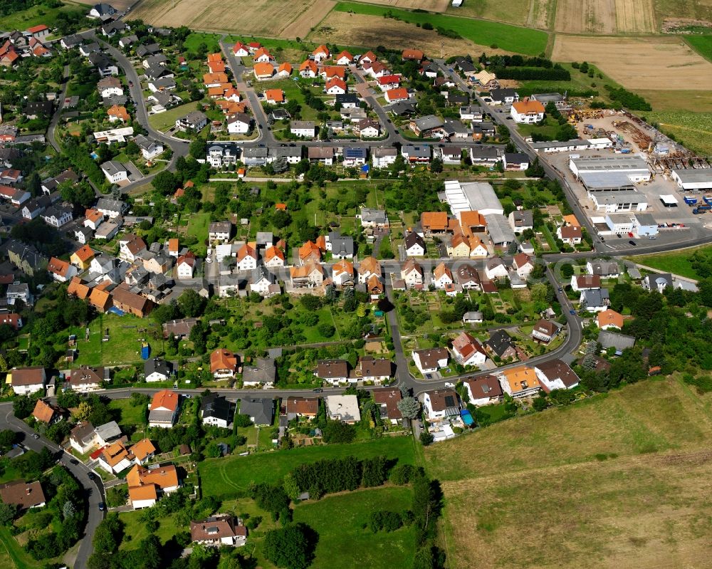 Burkhardsfelden from above - Residential area - mixed development of a multi-family housing estate and single-family housing estate in Burkhardsfelden in the state Hesse, Germany