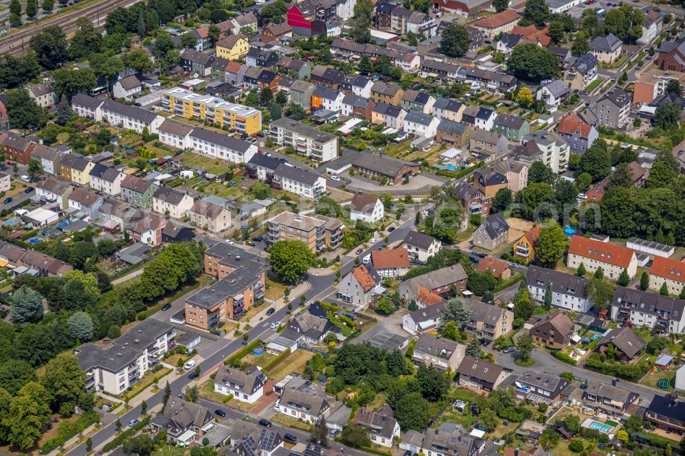 Aerial image Castrop-Rauxel - Residential area - mixed development of a multi-family housing estate and single-family housing estate on street Schulstrasse in the district Bladenhorst in Castrop-Rauxel at Ruhrgebiet in the state North Rhine-Westphalia, Germany