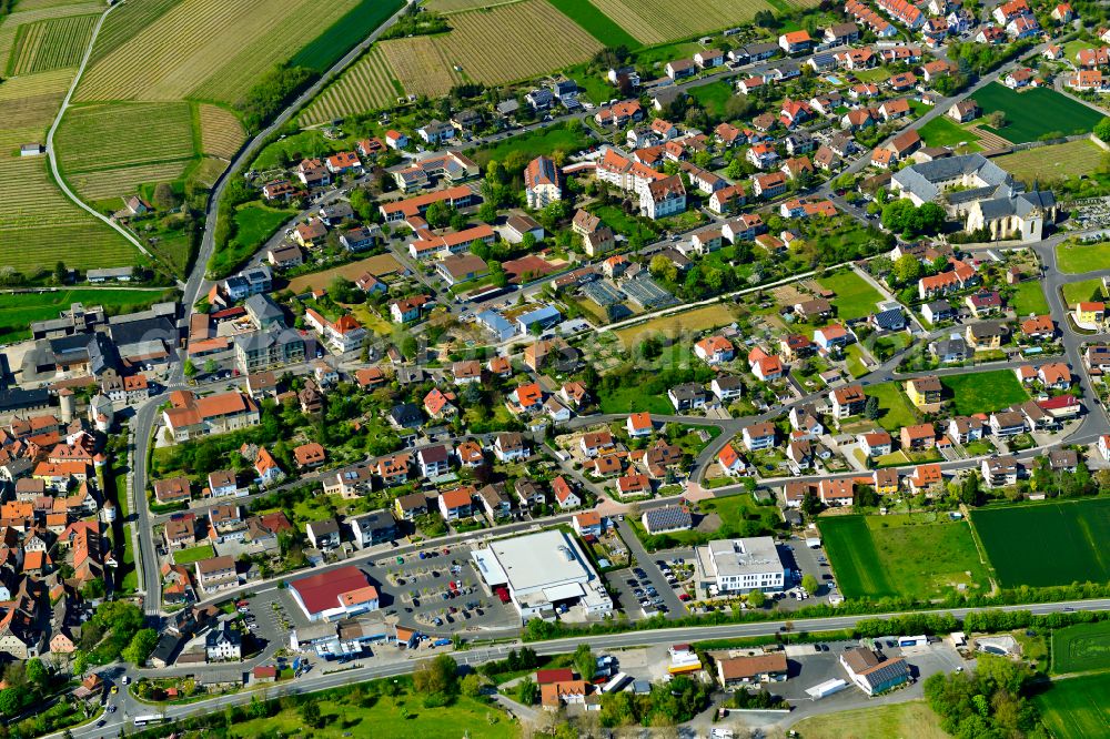 Dettelbach from the bird's eye view: Residential area - mixed development of a multi-family housing estate and single-family housing estate in Dettelbach in the state Bavaria, Germany