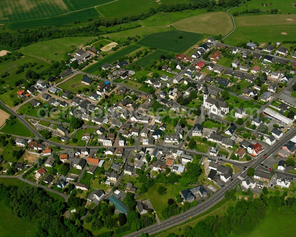 Aerial image Dorchheim - Residential area - mixed development of a multi-family housing estate and single-family housing estate in Dorchheim in the state Hesse, Germany