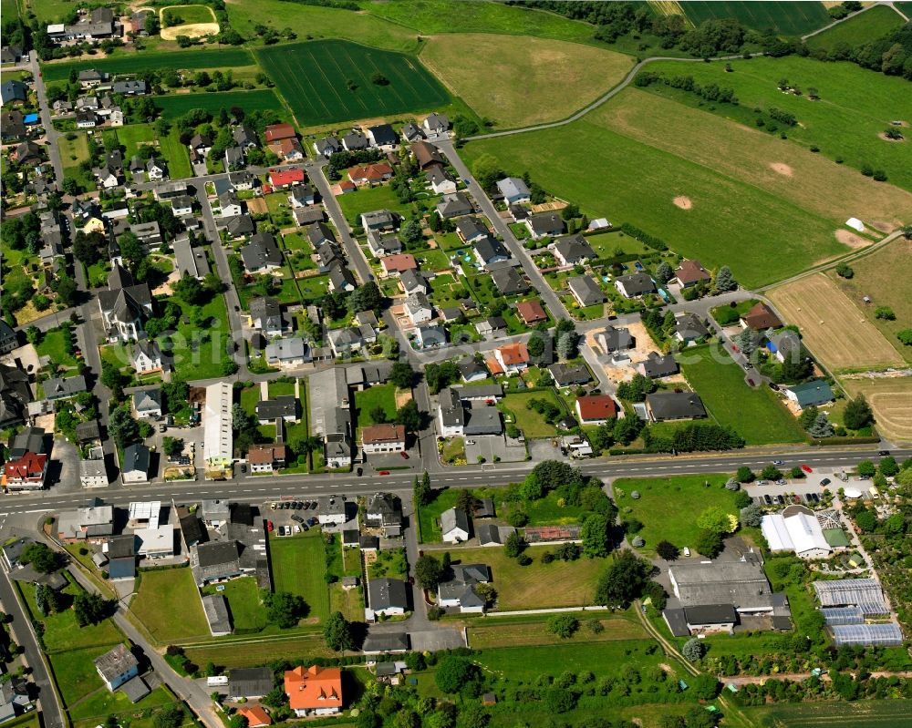 Dorchheim from above - Residential area - mixed development of a multi-family housing estate and single-family housing estate in Dorchheim in the state Hesse, Germany