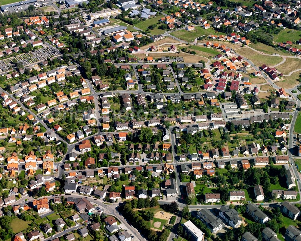 Dorf-Erbach from above - Residential area - mixed development of a multi-family housing estate and single-family housing estate in Dorf-Erbach in the state Hesse, Germany