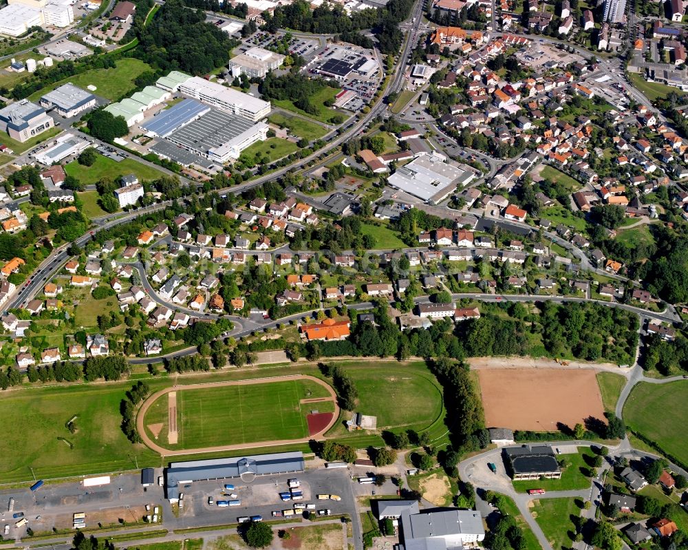 Dorf-Erbach from above - Residential area - mixed development of a multi-family housing estate and single-family housing estate in Dorf-Erbach in the state Hesse, Germany