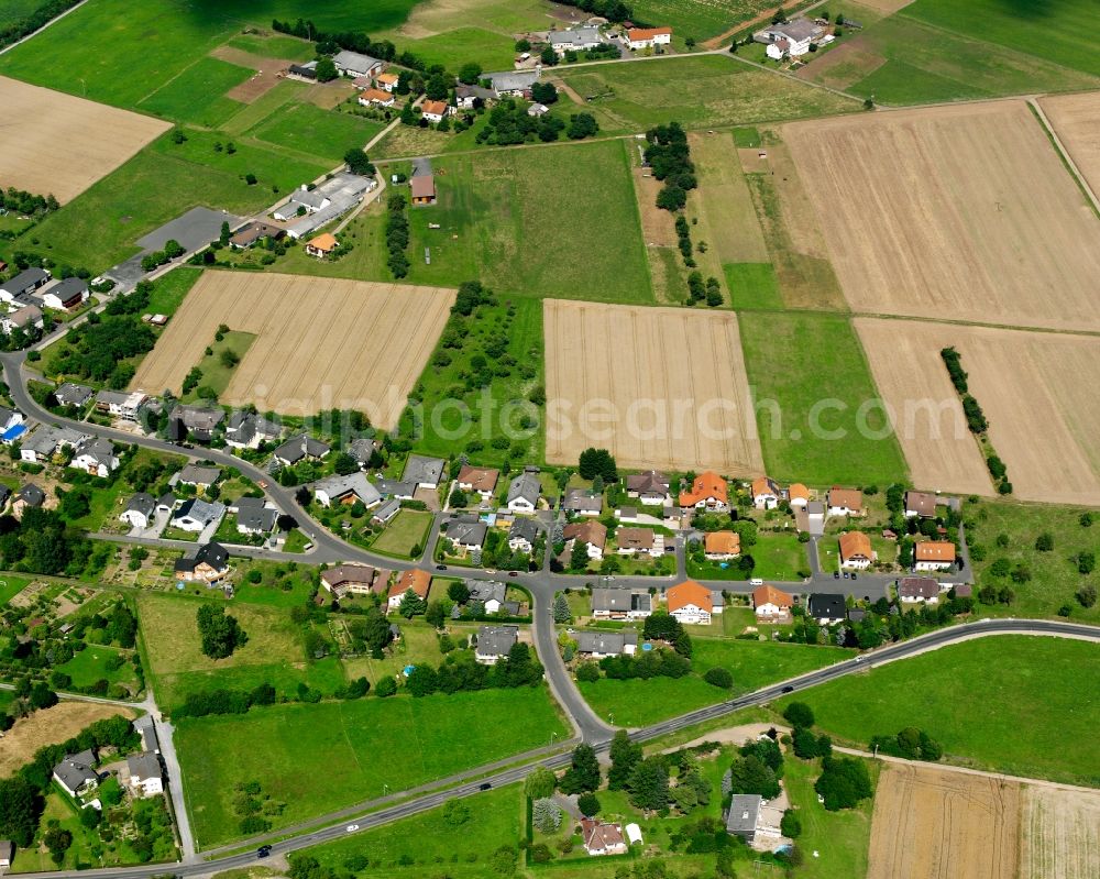 Aerial image Dorf-Güll - Residential area - mixed development of a multi-family housing estate and single-family housing estate in Dorf-Güll in the state Hesse, Germany