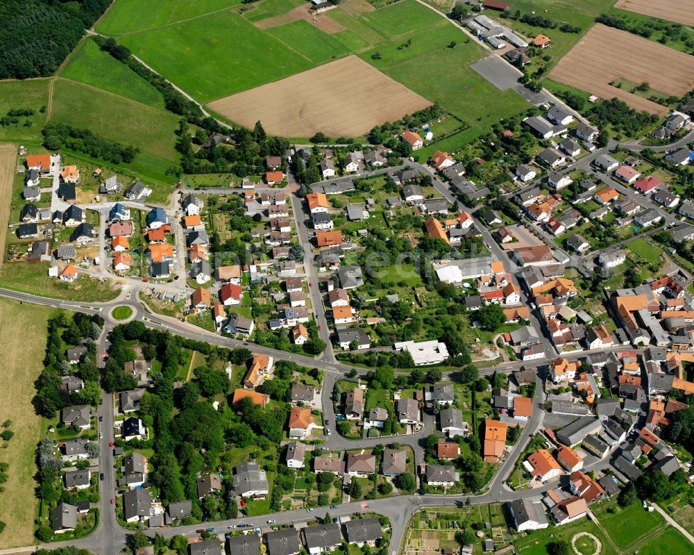 Dorf-Güll from above - Residential area - mixed development of a multi-family housing estate and single-family housing estate in Dorf-Güll in the state Hesse, Germany