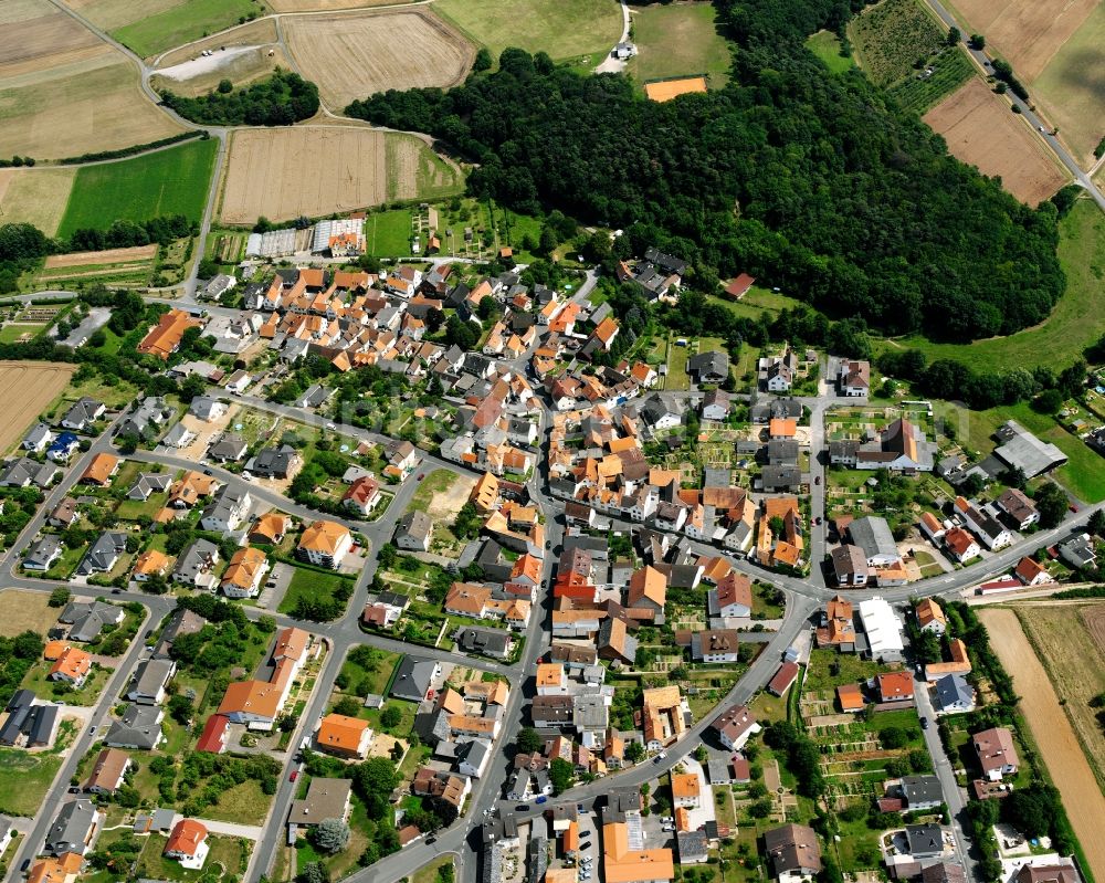 Aerial image Dornholzhausen - Residential area - mixed development of a multi-family housing estate and single-family housing estate in Dornholzhausen in the state Hesse, Germany