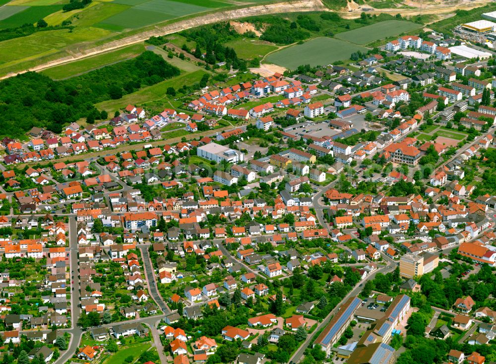 Eisenberg (Pfalz) from the bird's eye view: Residential area - mixed development of a multi-family housing estate and single-family housing estate in Eisenberg (Pfalz) in the state Rhineland-Palatinate, Germany