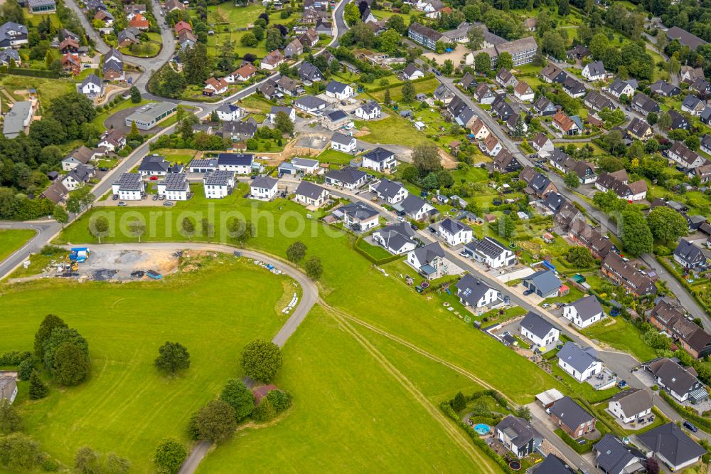 Erndtebrück from the bird's eye view: Residential area - mixed development of a multi-family housing estate and single-family housing estate in Erndtebrueck at Siegerland in the state North Rhine-Westphalia, Germany