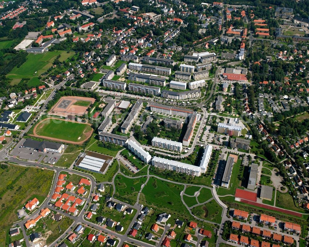 Friedeburg from the bird's eye view: Residential area - mixed development of a multi-family housing estate and single-family housing estate in Friedeburg in the state Saxony, Germany