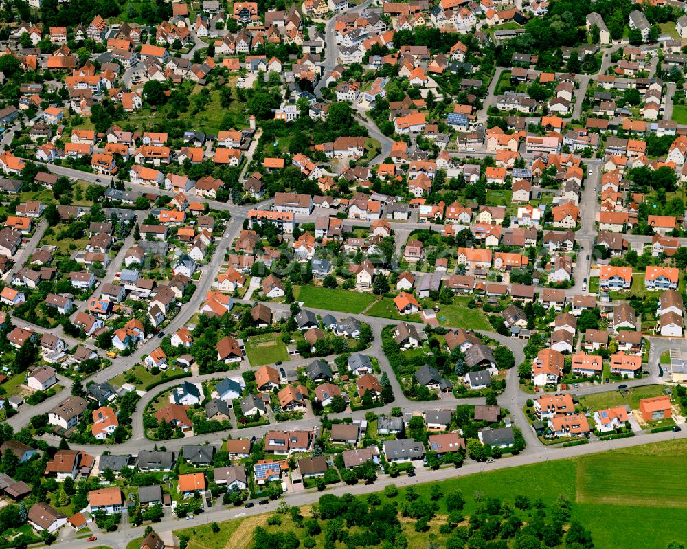 Gomaringen from the bird's eye view: Residential area - mixed development of a multi-family housing estate and single-family housing estate in Gomaringen in the state Baden-Wuerttemberg, Germany