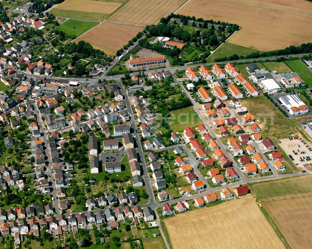 Aerial image Großen-Linden - Residential area - mixed development of a multi-family housing estate and single-family housing estate in Großen-Linden in the state Hesse, Germany