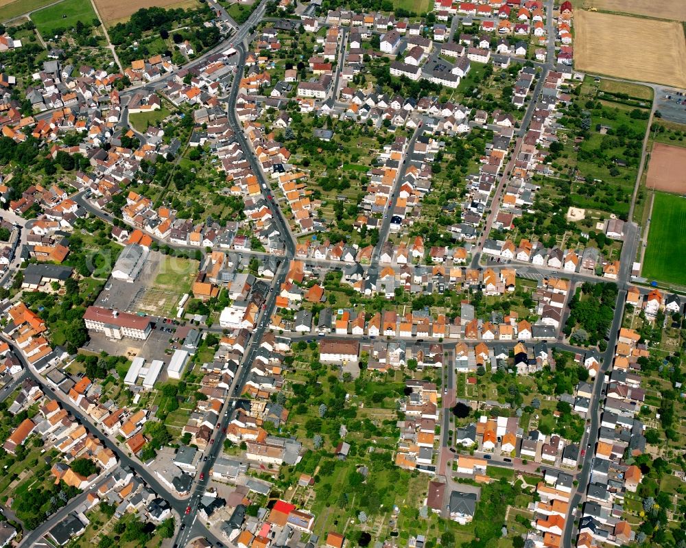 Aerial photograph Großen-Linden - Residential area - mixed development of a multi-family housing estate and single-family housing estate in Großen-Linden in the state Hesse, Germany