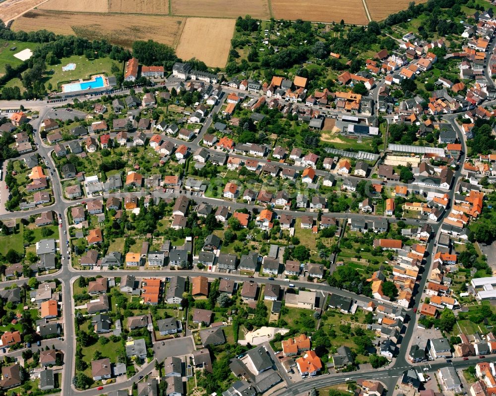 Großen-Linden from the bird's eye view: Residential area - mixed development of a multi-family housing estate and single-family housing estate in Großen-Linden in the state Hesse, Germany