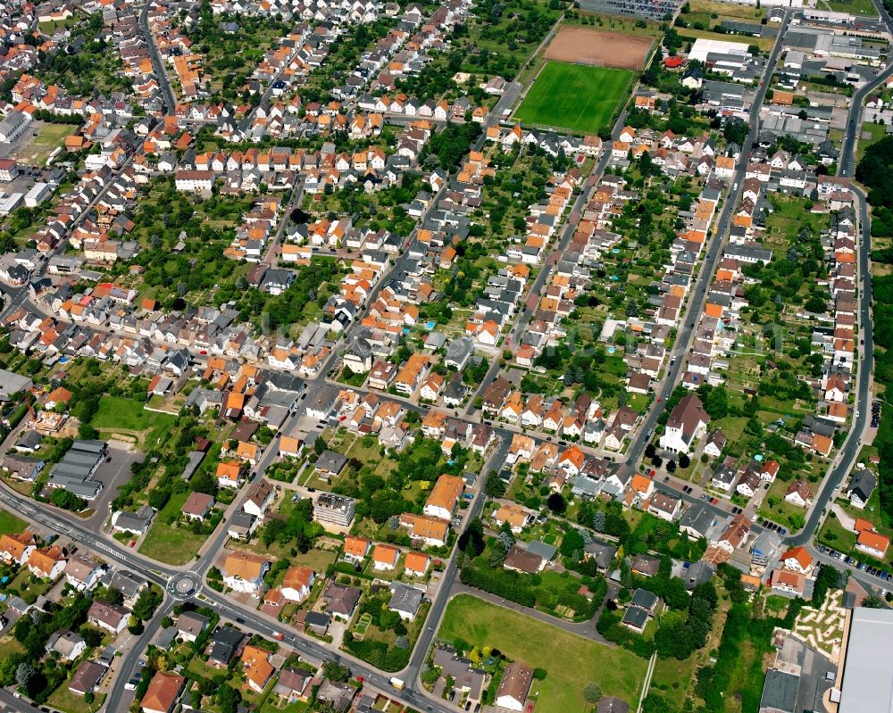 Aerial image Großen-Linden - Residential area - mixed development of a multi-family housing estate and single-family housing estate in Großen-Linden in the state Hesse, Germany