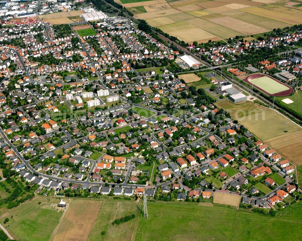 Aerial photograph Großen-Linden - Residential area - mixed development of a multi-family housing estate and single-family housing estate in Großen-Linden in the state Hesse, Germany