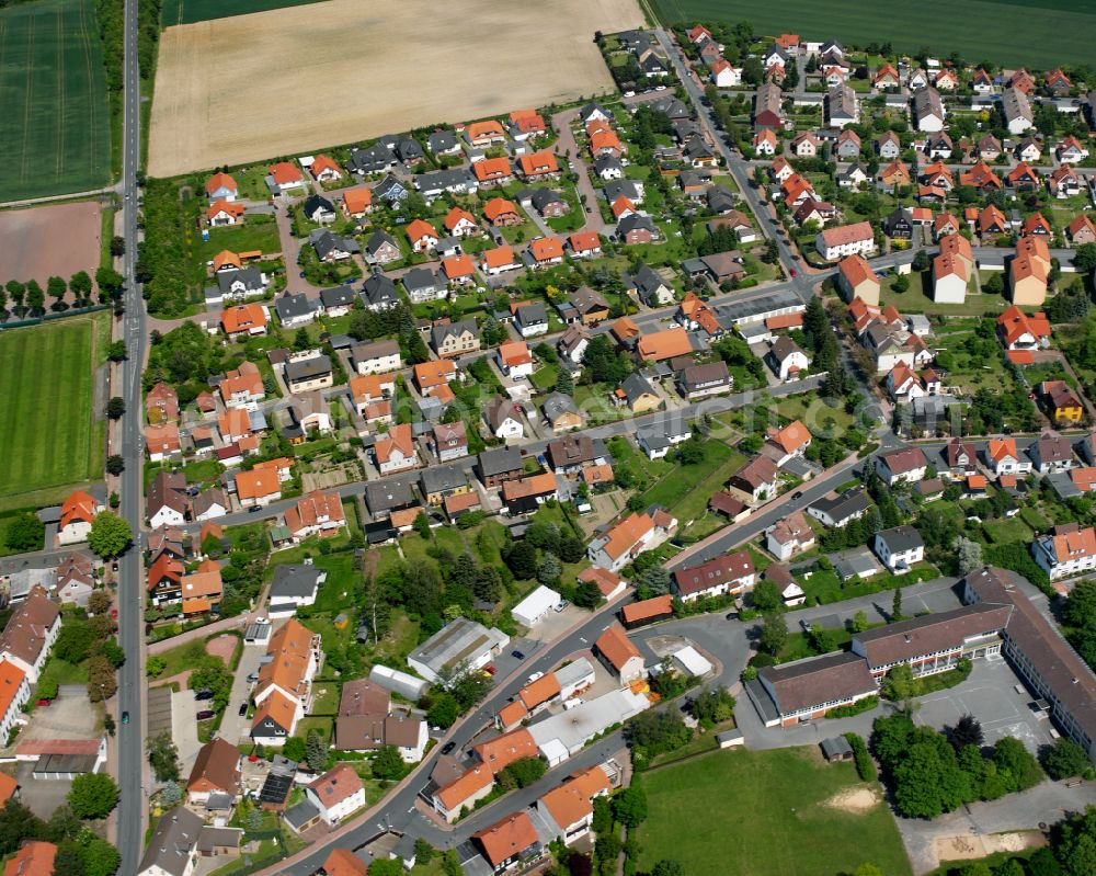 Harlingerode from the bird's eye view: Residential area - mixed development of a multi-family housing estate and single-family housing estate in Harlingerode in the state Lower Saxony, Germany