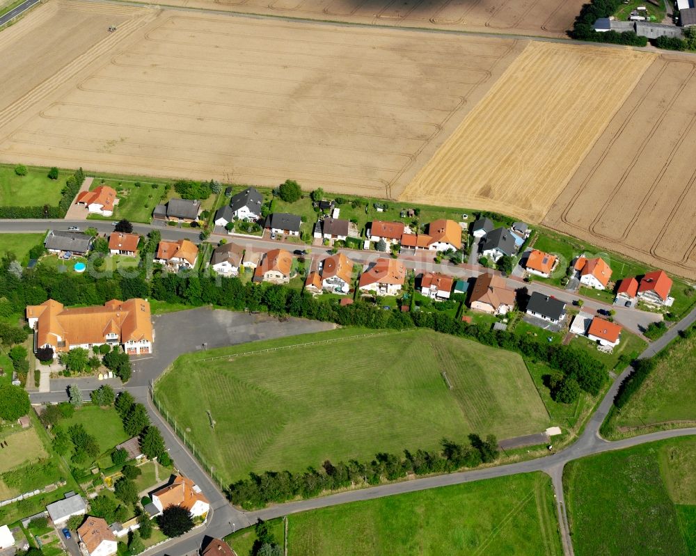 Aerial photograph Hattenrod - Residential area - mixed development of a multi-family housing estate and single-family housing estate in Hattenrod in the state Hesse, Germany