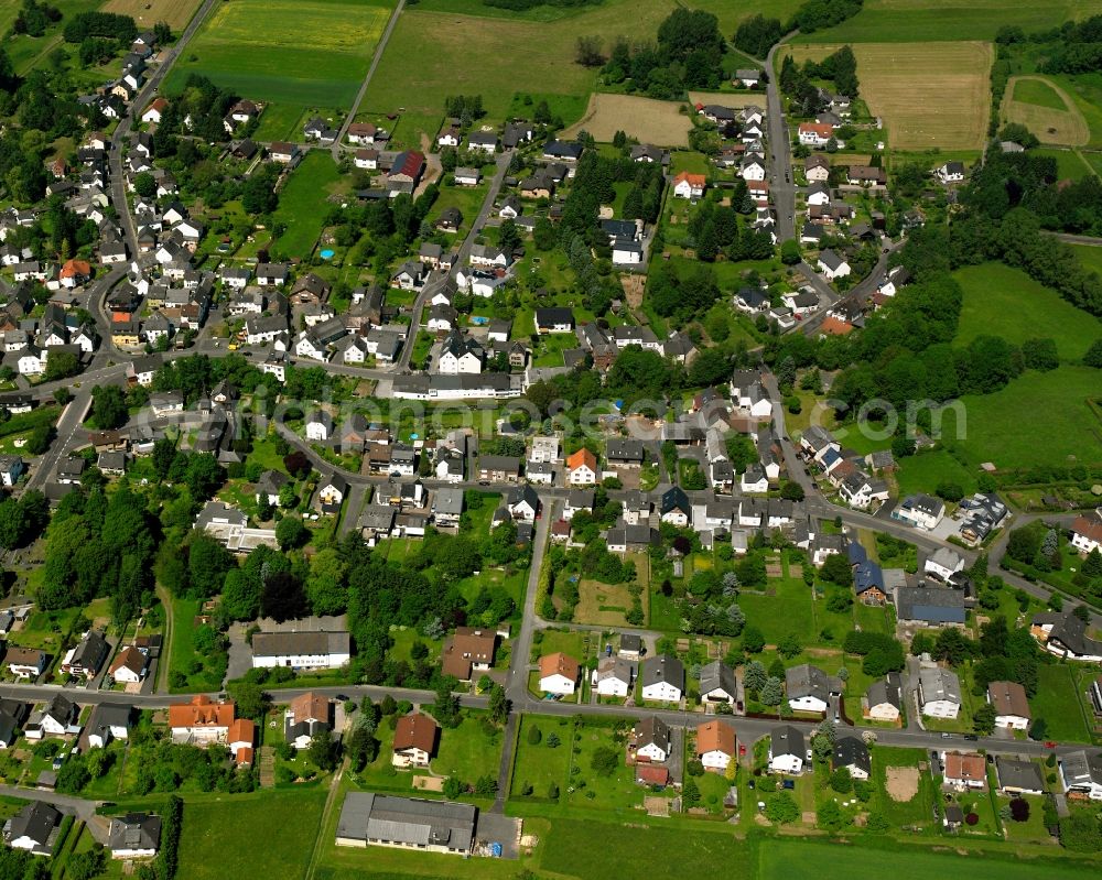 Hausen from above - Residential area - mixed development of a multi-family housing estate and single-family housing estate in Hausen in the state Hesse, Germany