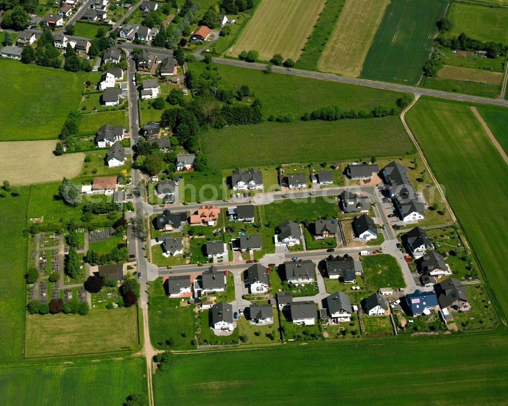 Hausen from the bird's eye view: Residential area - mixed development of a multi-family housing estate and single-family housing estate in Hausen in the state Hesse, Germany