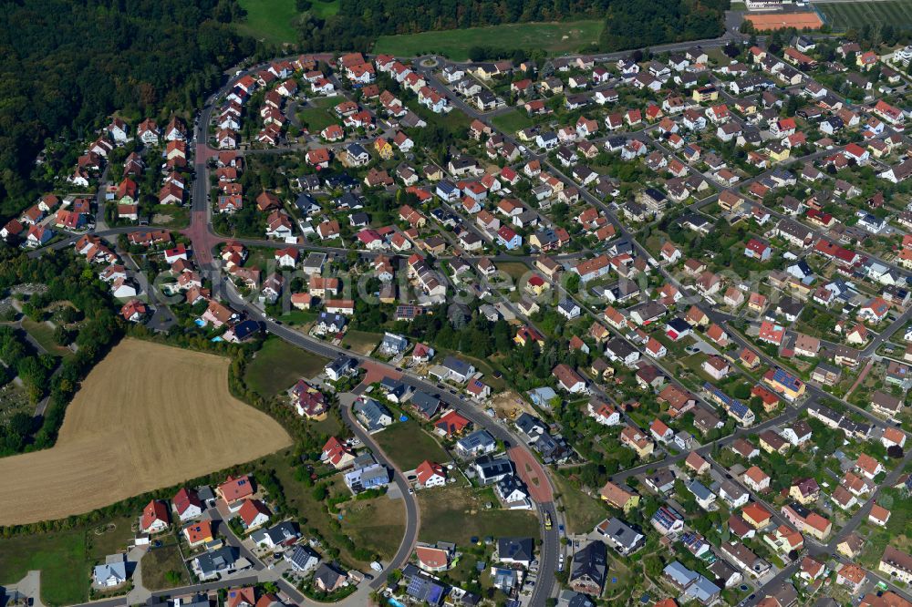 Aerial image Höchberg - Residential area - mixed development of a multi-family housing estate and single-family housing estate in Höchberg in the state Bavaria, Germany