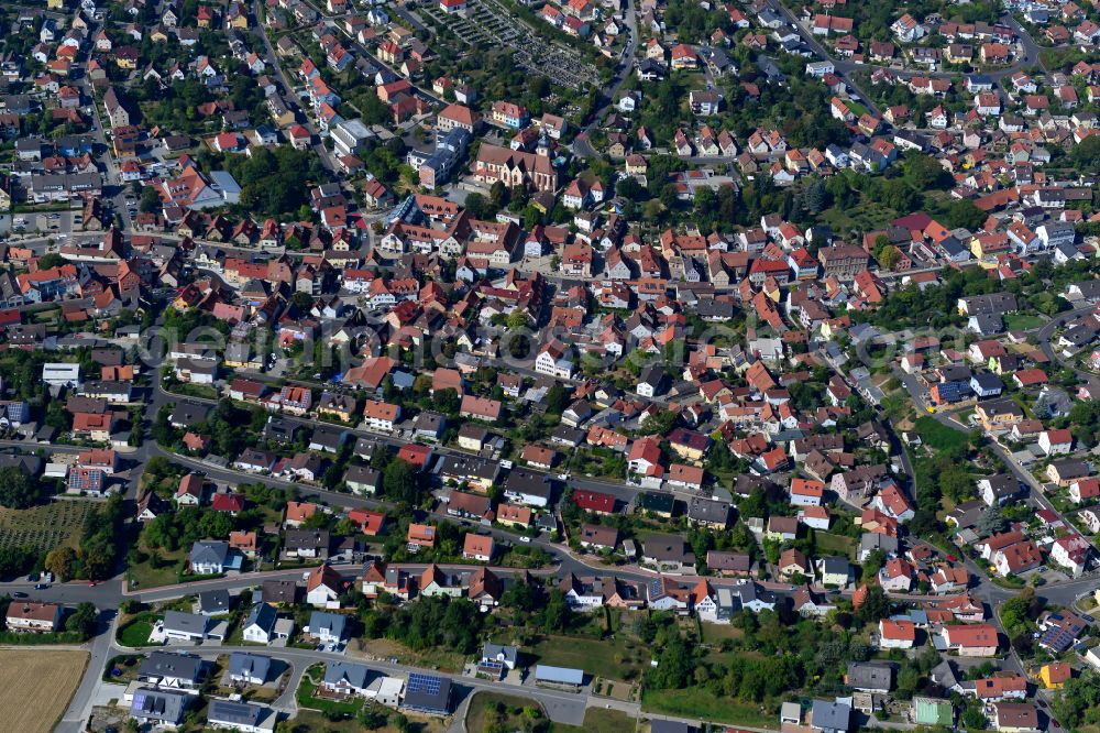 Aerial image Höchberg - Residential area - mixed development of a multi-family housing estate and single-family housing estate in Höchberg in the state Bavaria, Germany