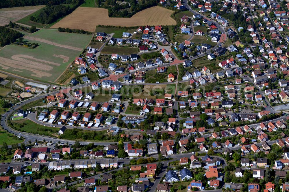 Aerial photograph Höchberg - Residential area - mixed development of a multi-family housing estate and single-family housing estate in Höchberg in the state Bavaria, Germany