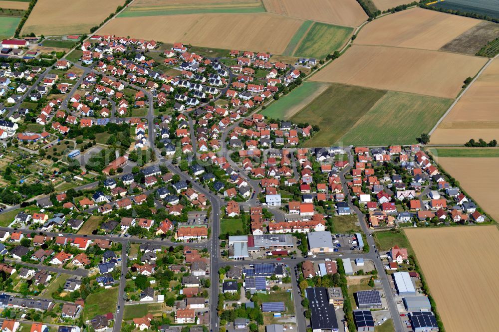 Aerial image Hettstadt - Residential area - mixed development of a multi-family housing estate and single-family housing estate in Hettstadt in the state Bavaria, Germany