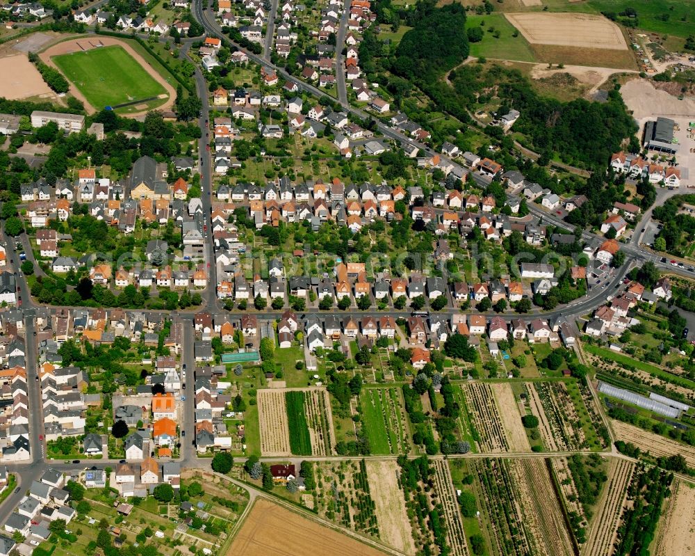 Aerial image Heuchelheim - Residential area - mixed development of a multi-family housing estate and single-family housing estate in Heuchelheim in the state Hesse, Germany