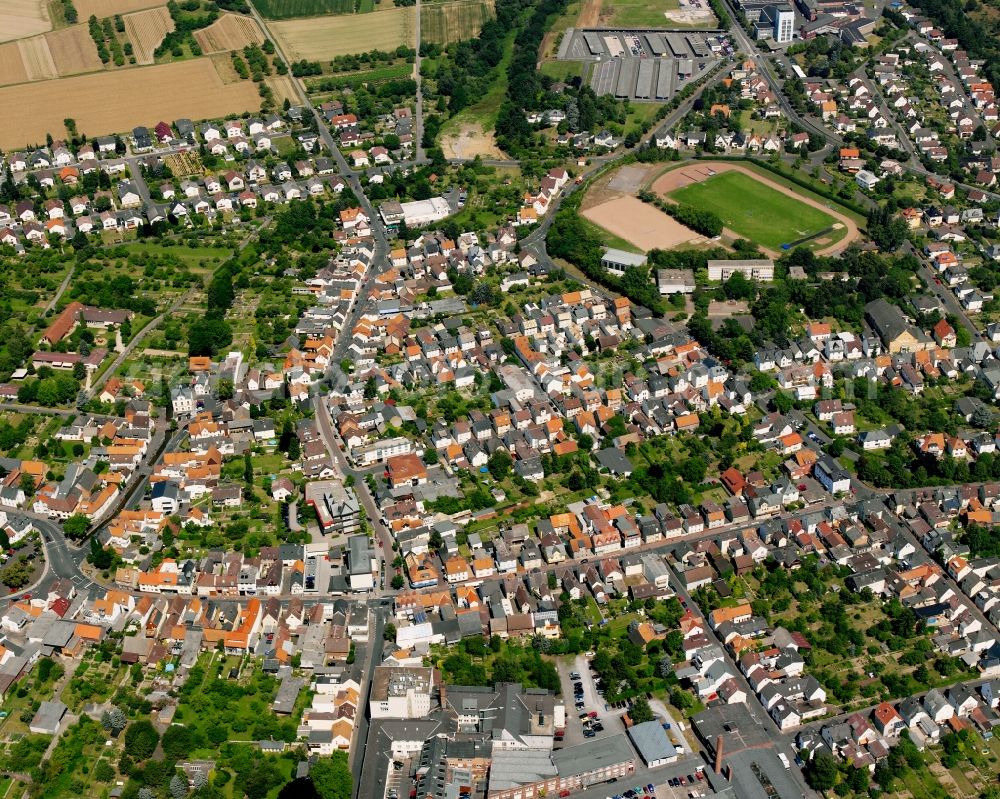 Aerial photograph Heuchelheim - Residential area - mixed development of a multi-family housing estate and single-family housing estate in Heuchelheim in the state Hesse, Germany