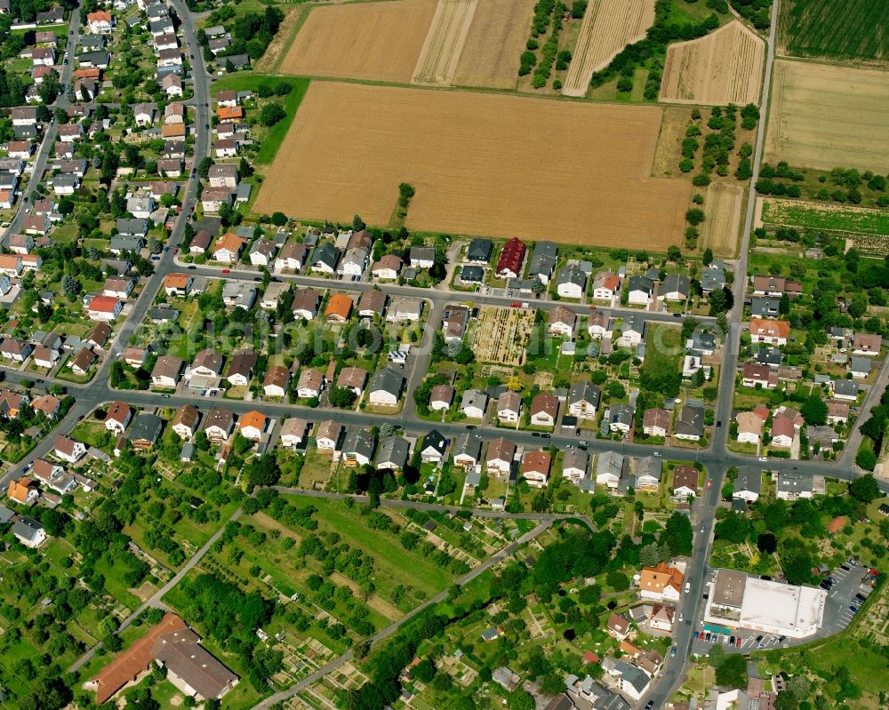 Aerial image Heuchelheim - Residential area - mixed development of a multi-family housing estate and single-family housing estate in Heuchelheim in the state Hesse, Germany