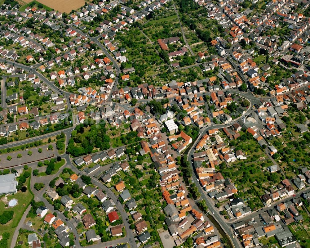 Heuchelheim from above - Residential area - mixed development of a multi-family housing estate and single-family housing estate in Heuchelheim in the state Hesse, Germany