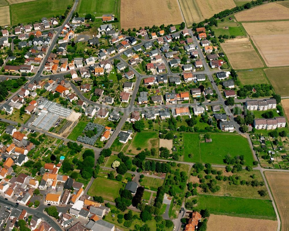 Heuchelheim from the bird's eye view: Residential area - mixed development of a multi-family housing estate and single-family housing estate in Heuchelheim in the state Hesse, Germany