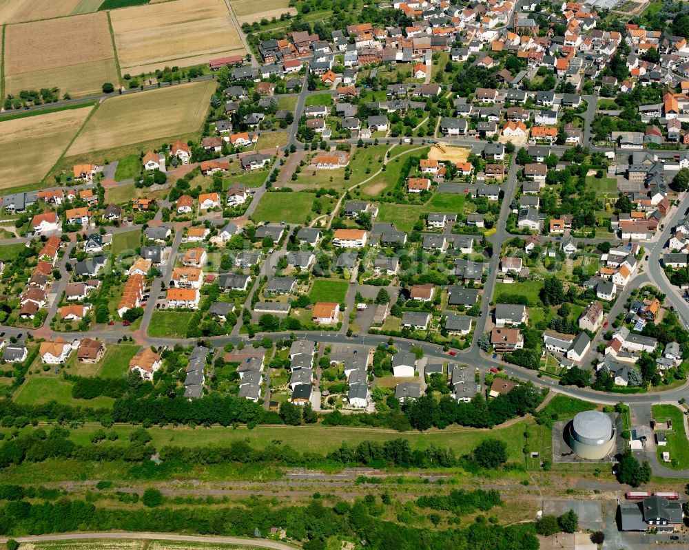 Heuchelheim from above - Residential area - mixed development of a multi-family housing estate and single-family housing estate in Heuchelheim in the state Hesse, Germany