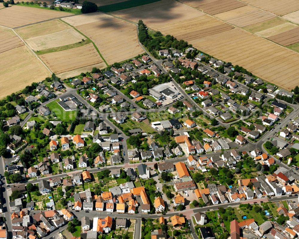 Holzheim from above - Residential area - mixed development of a multi-family housing estate and single-family housing estate in Holzheim in the state Hesse, Germany