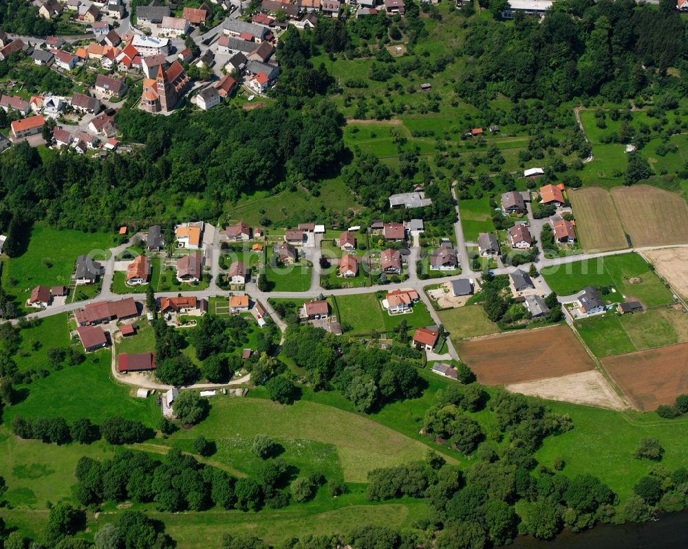 Hundersingen from above - Residential area - mixed development of a multi-family housing estate and single-family housing estate in Hundersingen in the state Baden-Wuerttemberg, Germany